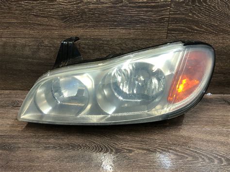 2002 infiniti i35 headlight metal box|Left Headlight Assembly replacement for 2002.